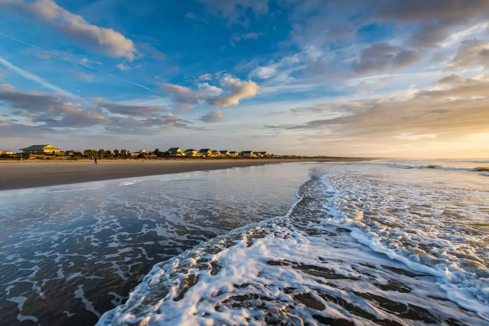Take a stroll on the beach, shelling is great but sharks teeth are more rewarding!