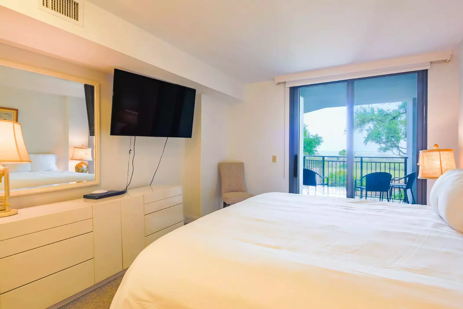 There is a covered seating area on the balcony just outside the master suite.