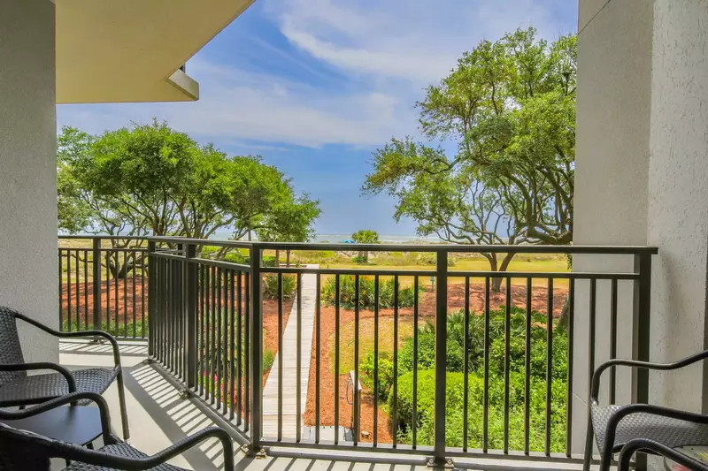 This covered seating area off of the master suite is the perfect spot to enjoy your morning coffee.