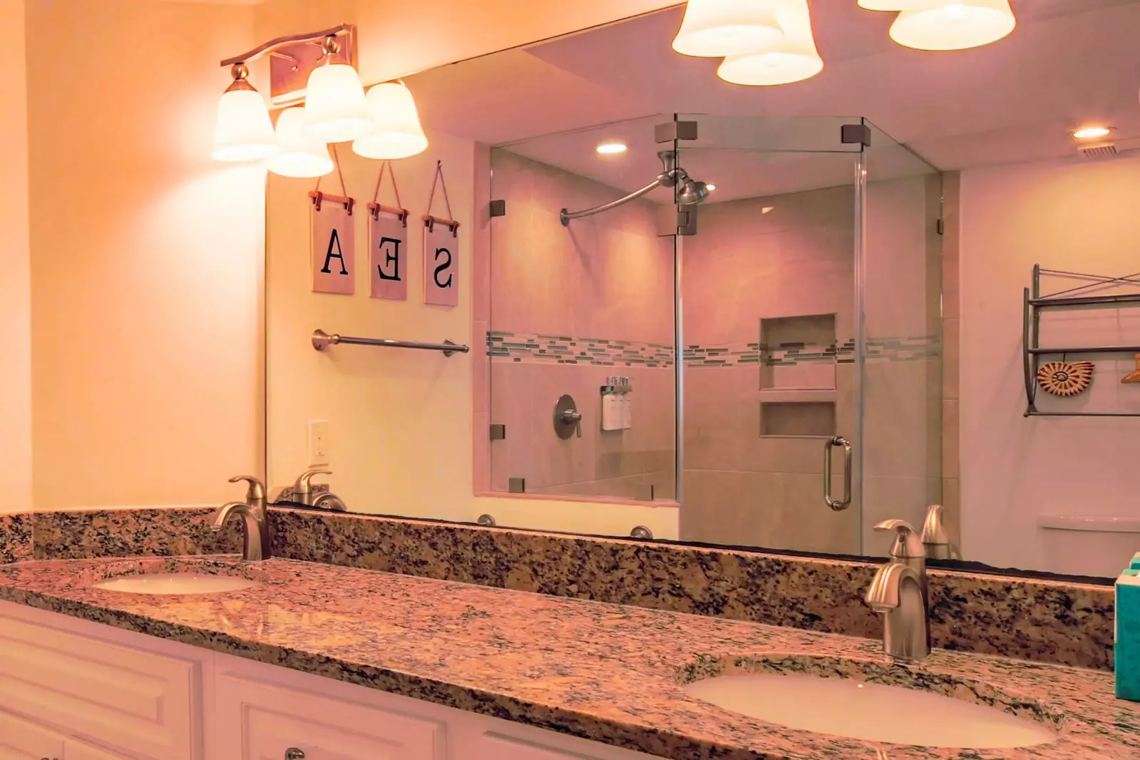 The en suite bathroom also has a spacious, dual sink vanity.