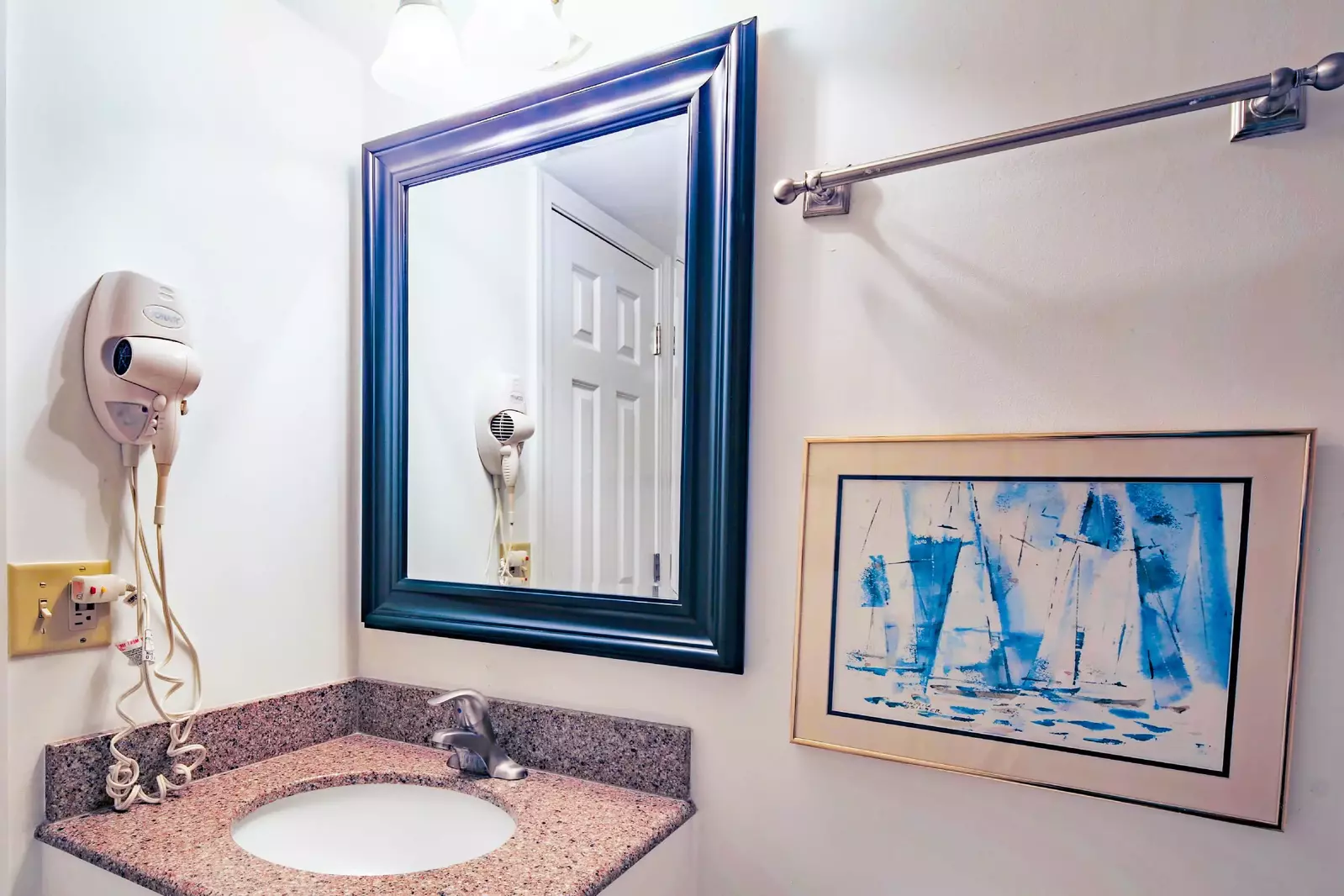 This bathroom is accessible from both the guest bedroom and the hallway.