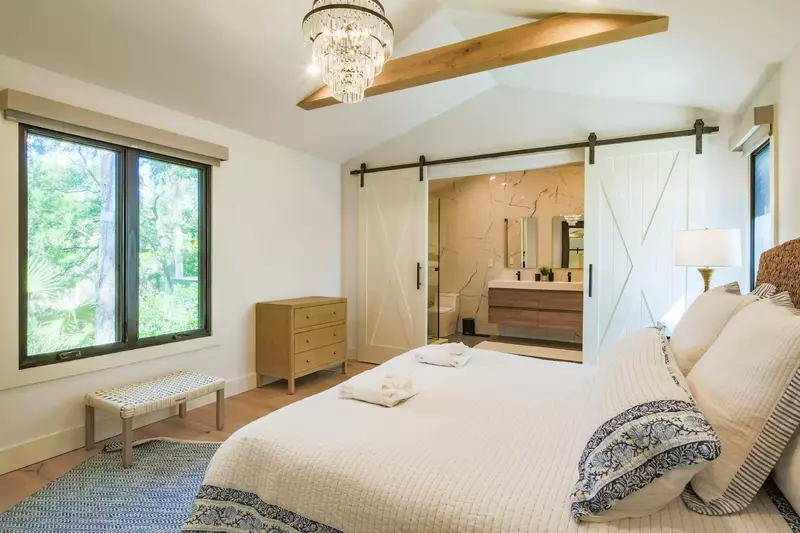 The primary bedroom features a king bed and en suite bathroom.
