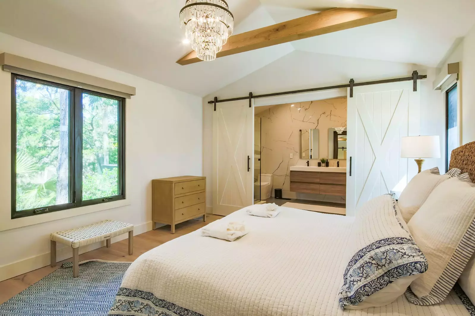 The primary bedroom features a king bed and en suite bathroom.