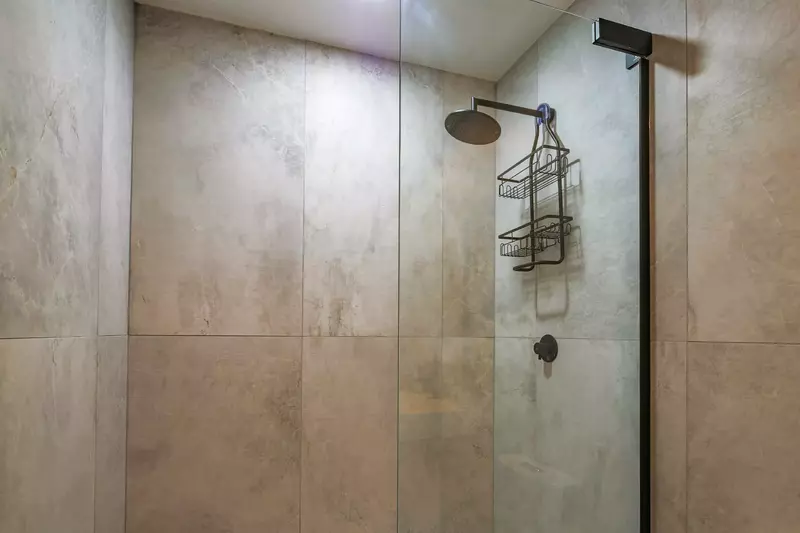 There is also a walk-in shower in the hallway bathroom.
