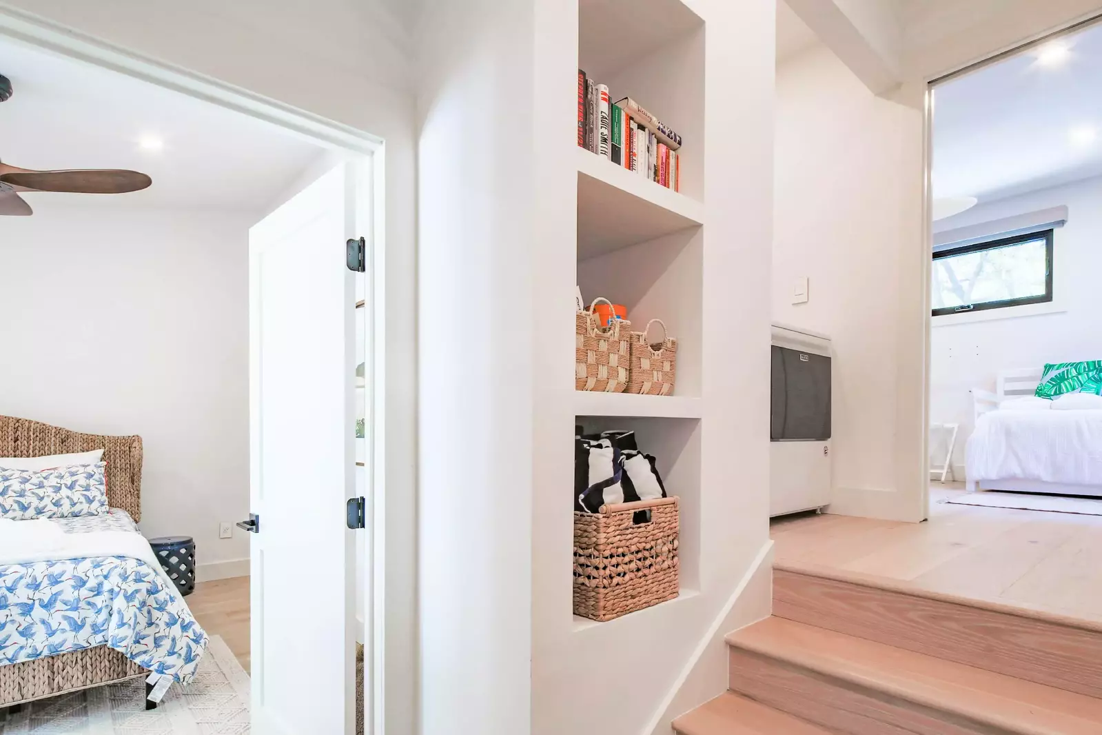 You will find the laundry area and bunk room up a half flight of stairs from the guest bedroom.