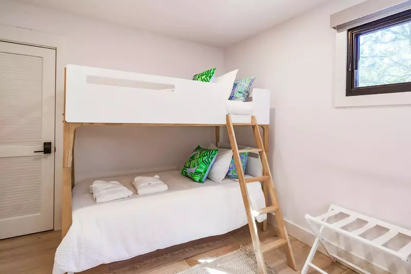 The bunk room features this bunk bed with two twin beds.