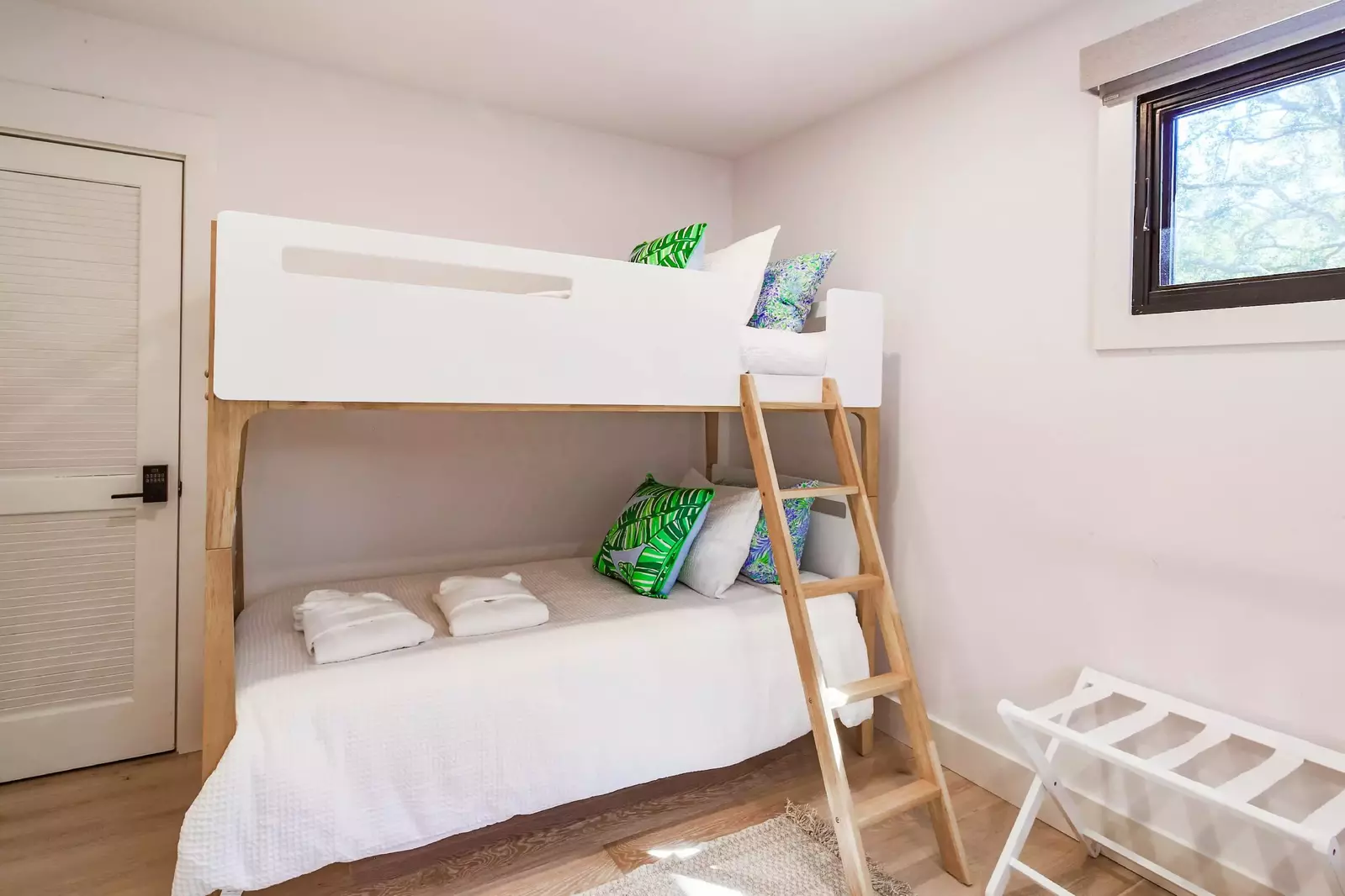 The bunk room features this bunk bed with two twin beds.