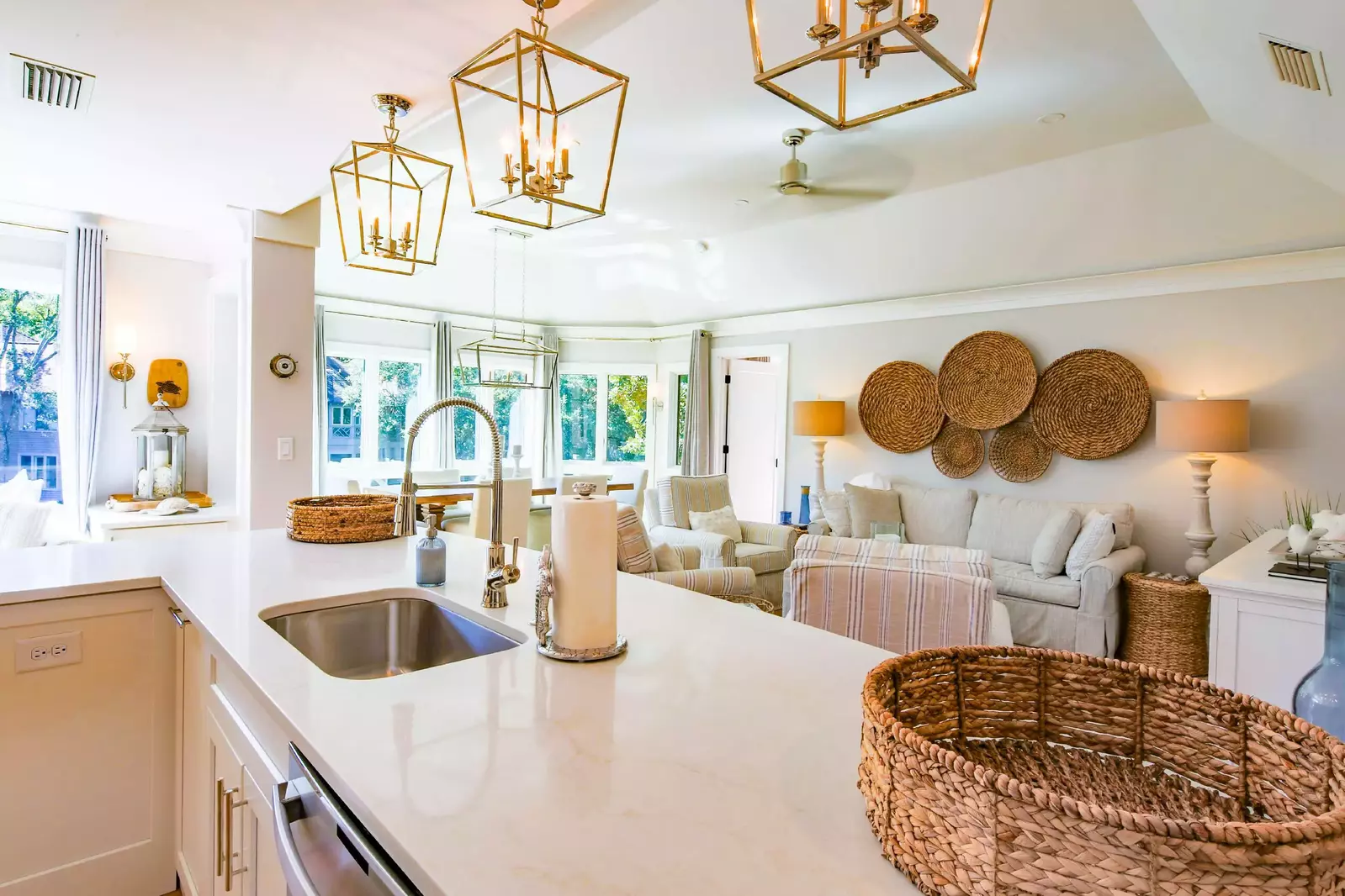 The sink and dishwasher are located in the kitchen island.