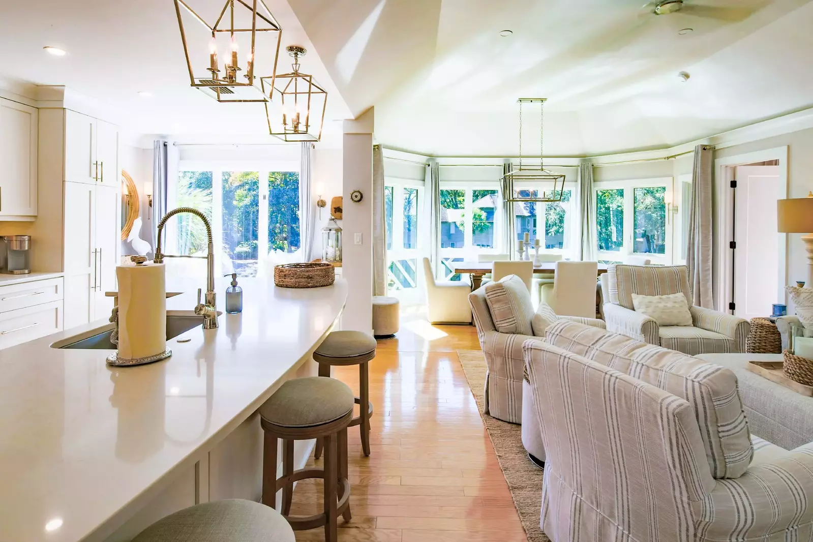 There is an open layout with terrific natural light between the kitchen, living room and dining area.