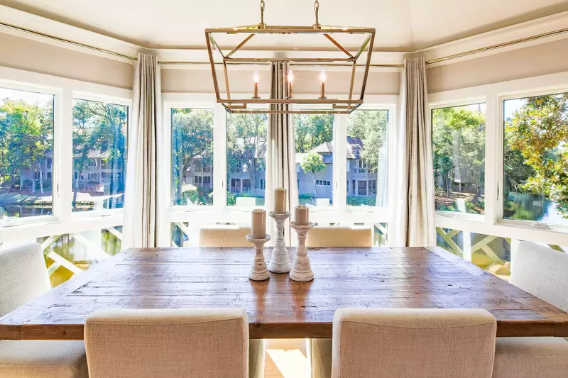The dining table comfortably seats 6.