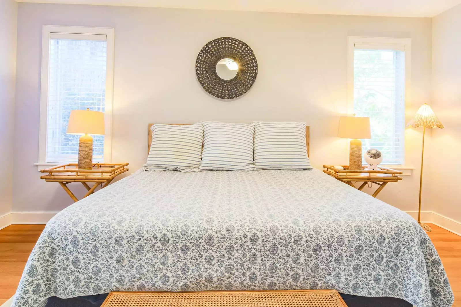 The master suite also has two night stands with reading lamps.