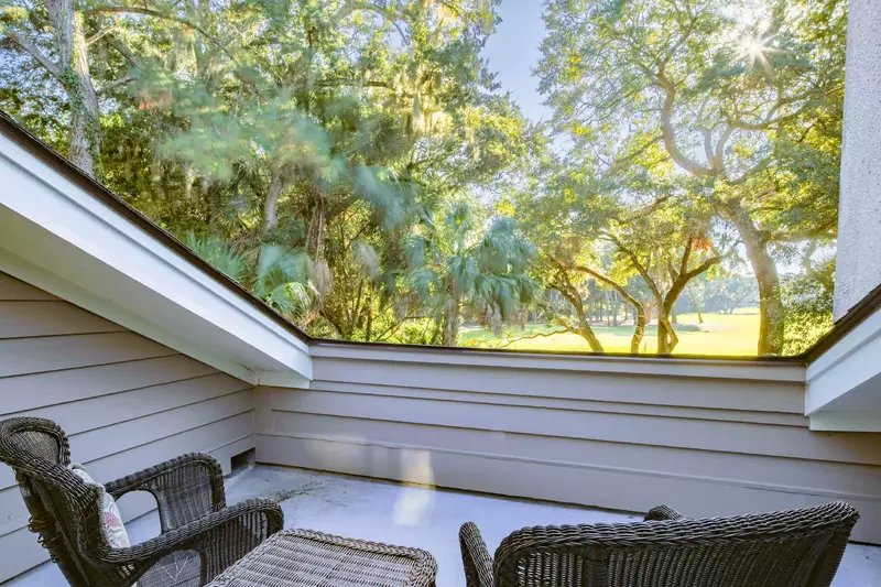 This private deck also overlooks the golf course and the treetops.