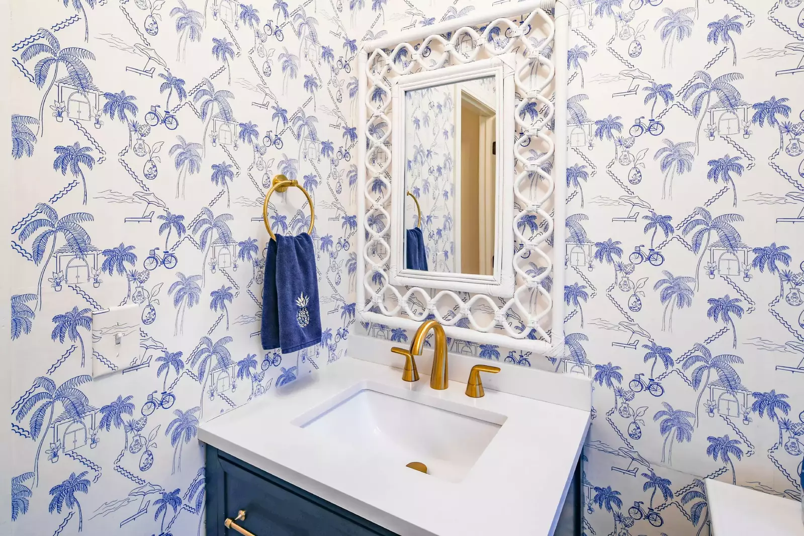 There is a half bathroom located on the home's lower level near the kitchen.