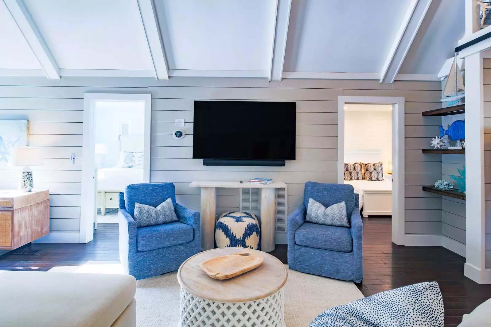 The home's bedrooms all connect to the central living room.