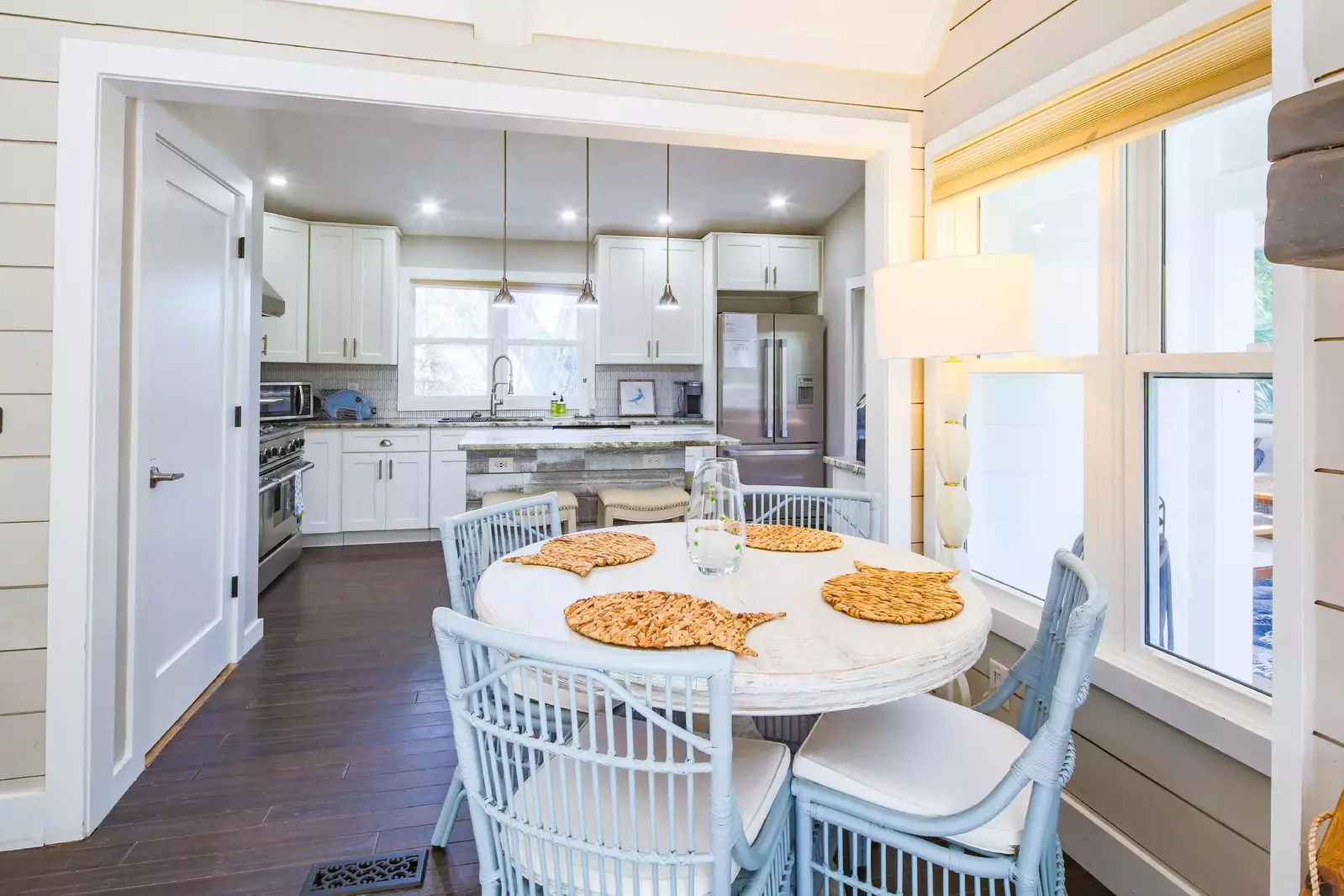 This dining area is located near the expansive chef's kitchen.