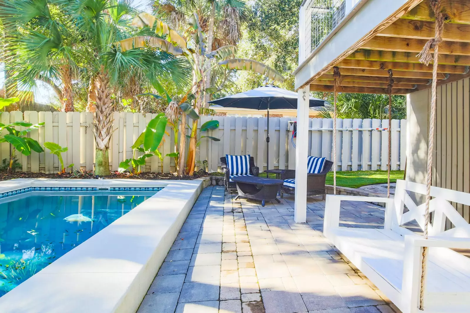 There is also a swing chair on the pool patio.