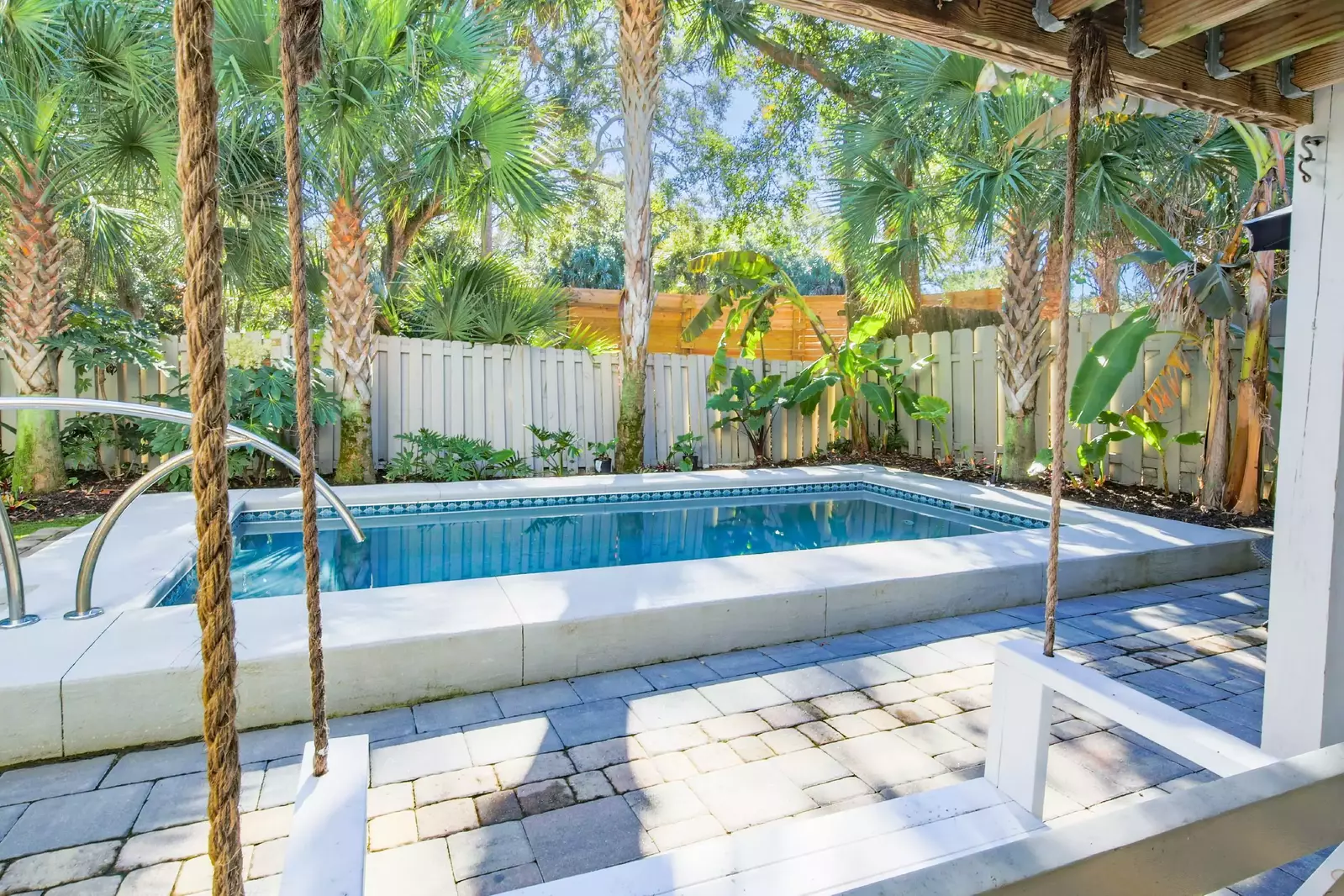 The swing chair is another great place to sit while keeping an eye on your kids in the pool.