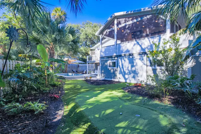 Practice your putting swing on the putting green in the backyard.