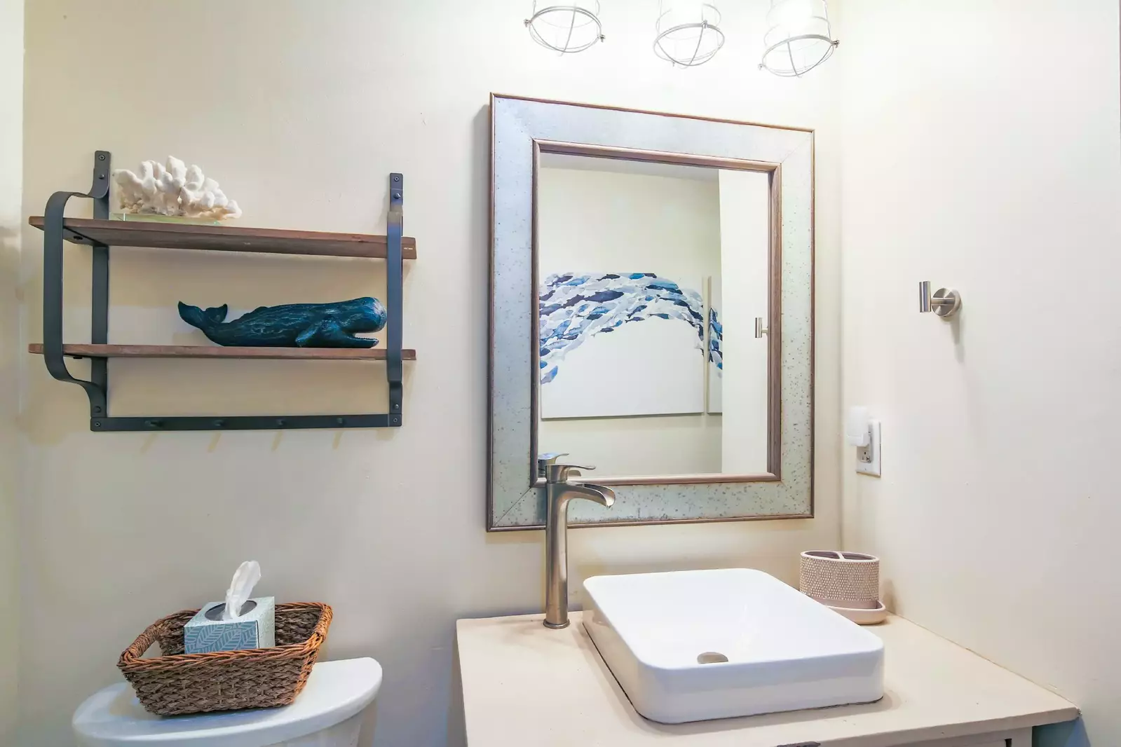 The hallway bathroom features a spacious vanity.
