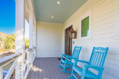 These rocking chairs on the front porch greet you as you arrive to the home.