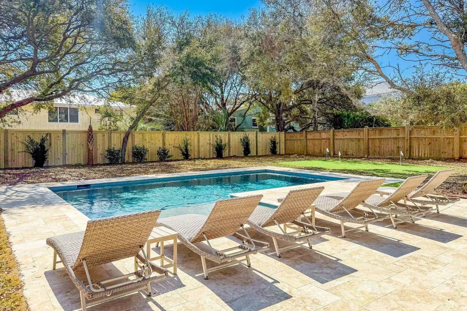 The private pool has a sun shelf and in-pool bench seating, making it easy to relax & unwind.