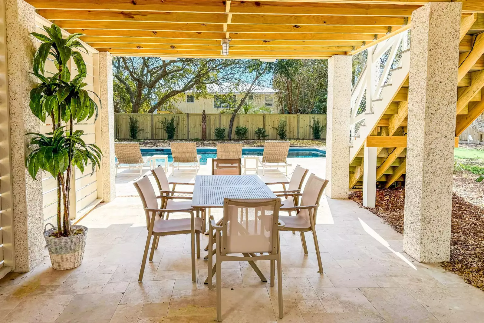 Enjoy meals outdoors on the sheltered patio by the pool!