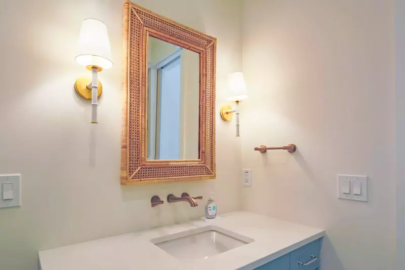 This bathroom is accessible from the downstairs guest bedroom and the hallway.
