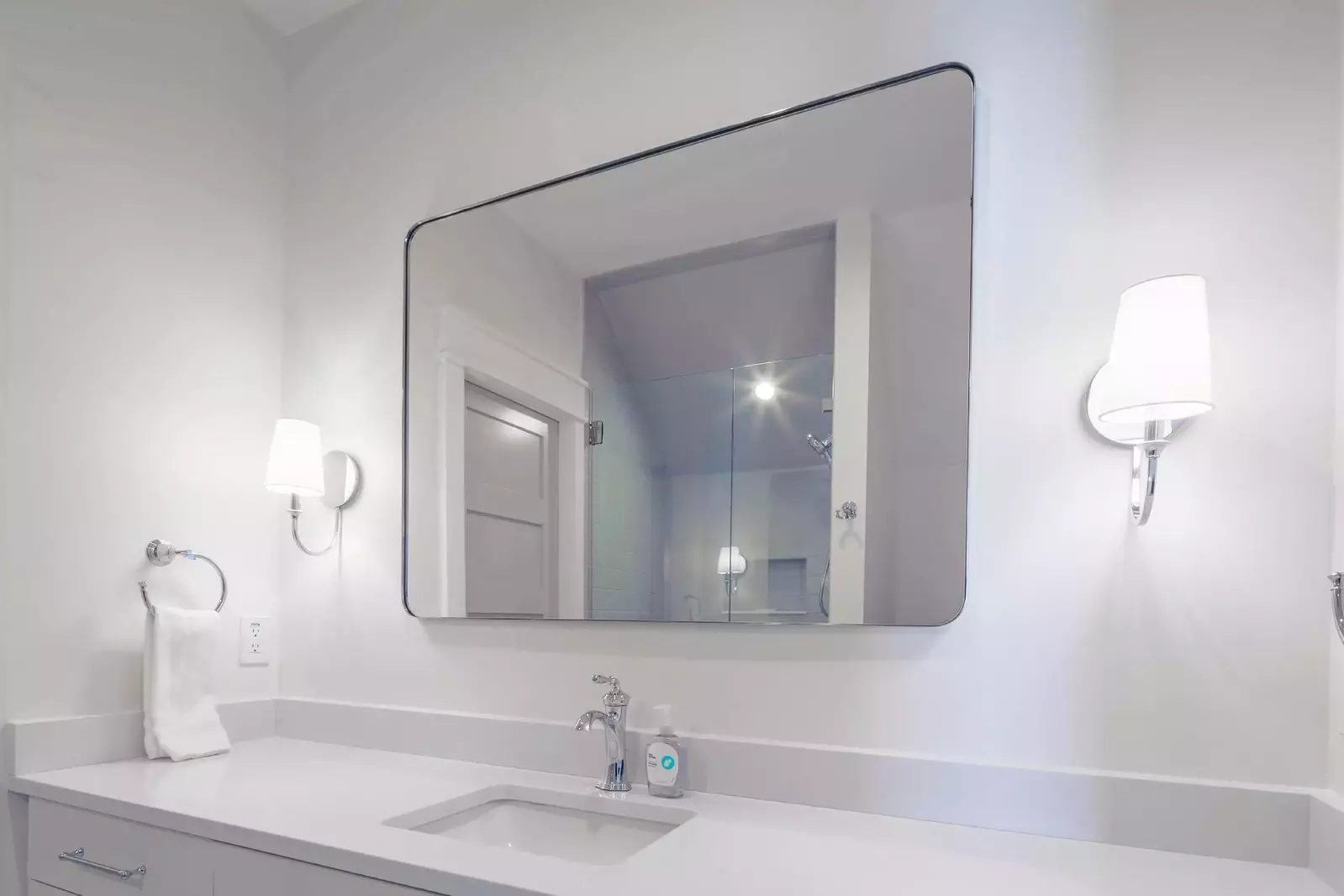 The Jack & Jill bathroom features a spacious vanity.