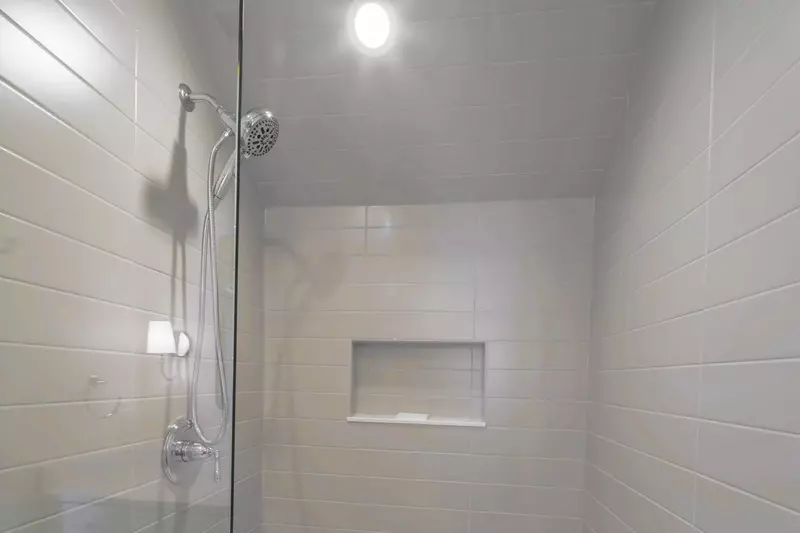 The Jack & Jill bathroom also has a tiled, walk-in shower.
