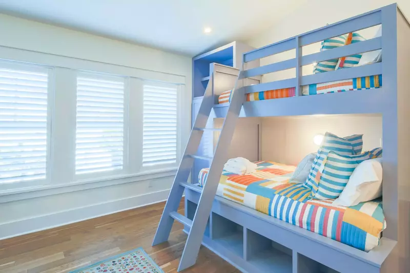 Each of the bunk beds has a full bed on the bottom and twin bed on top.