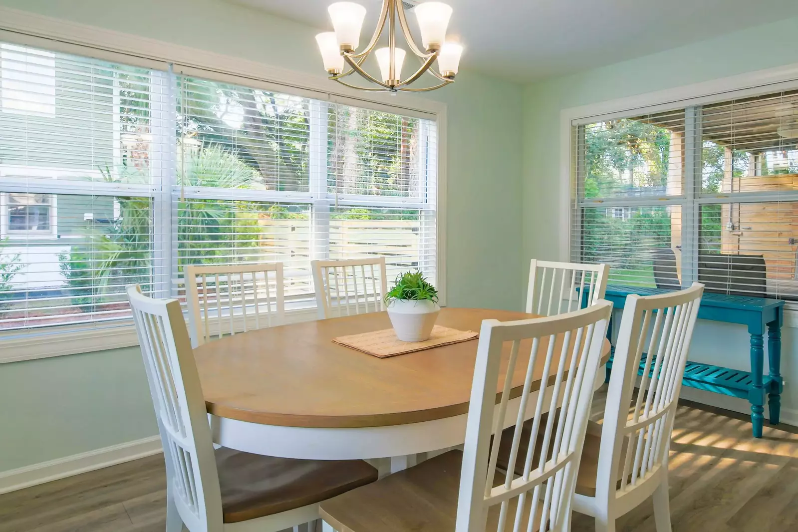 When you enter the home, you'll find this dining area with views of the covered back deck.