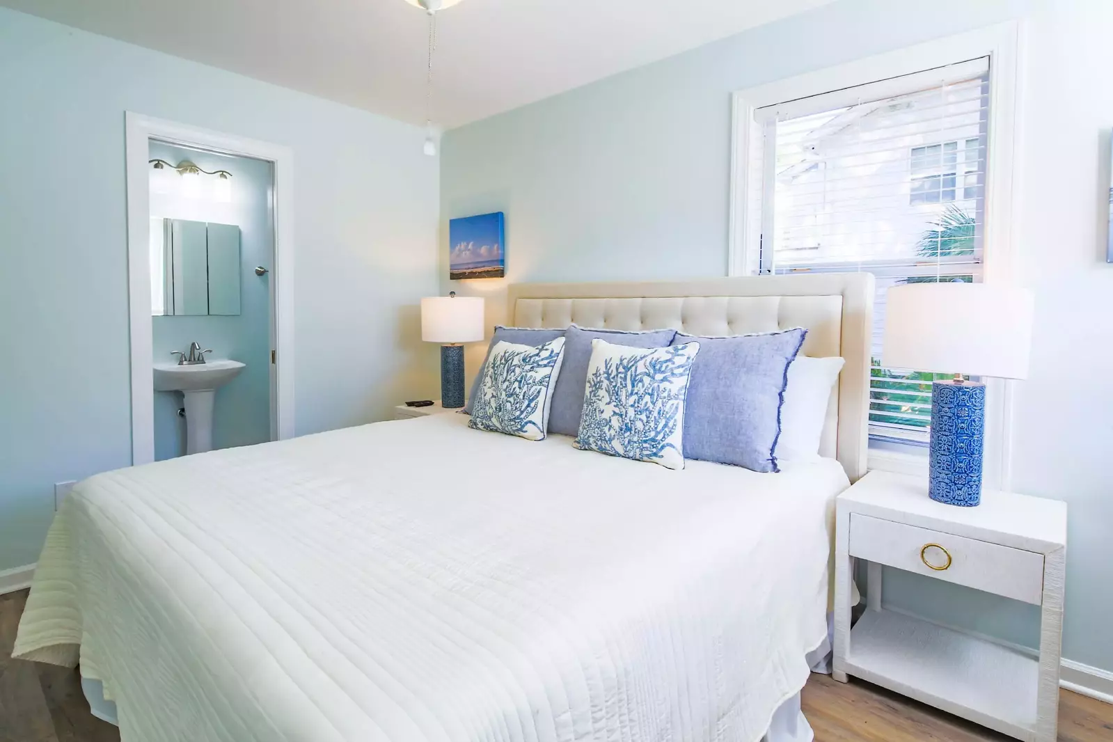 The door to the left of the bed leads to the en suite bathroom.
