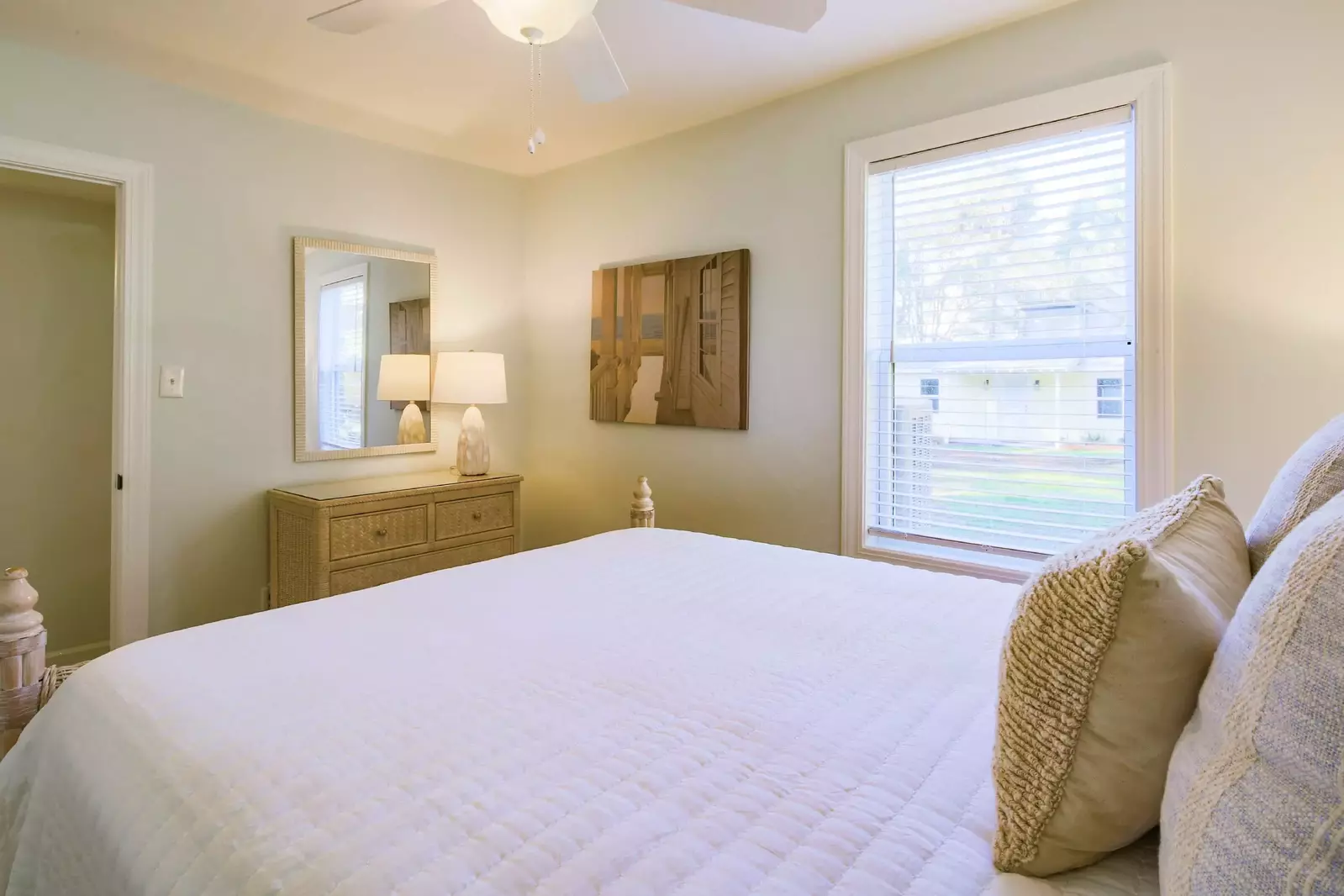 There is also a dresser and mirror in the queen bedroom.