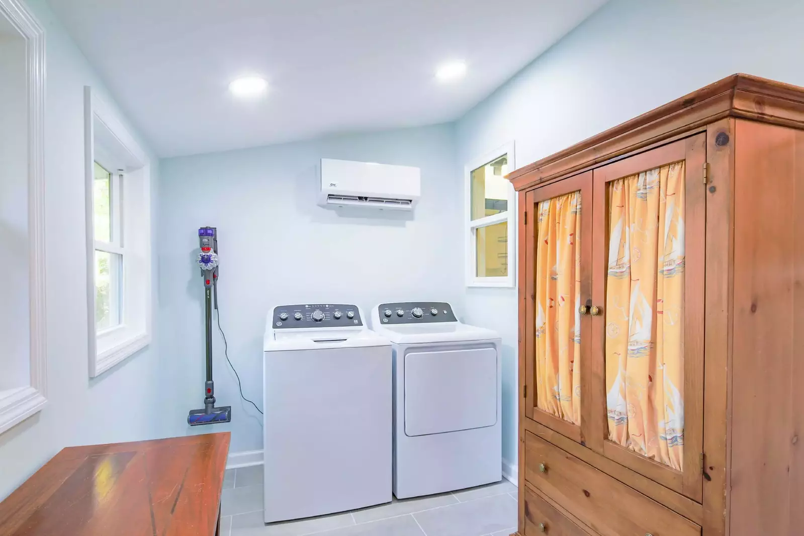There is a full-sized washing machine and dryer in the home.