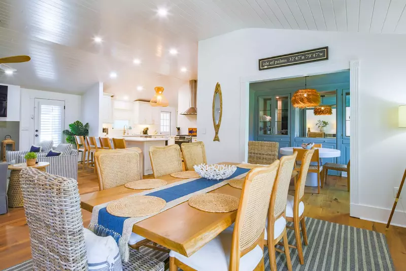 The home is decorated with a coastal design with a mix of blues, beiges and browns.