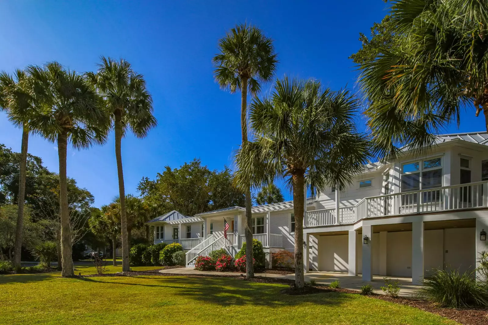 There are 20+ palm trees on the large yard surrounding this beautiful home.