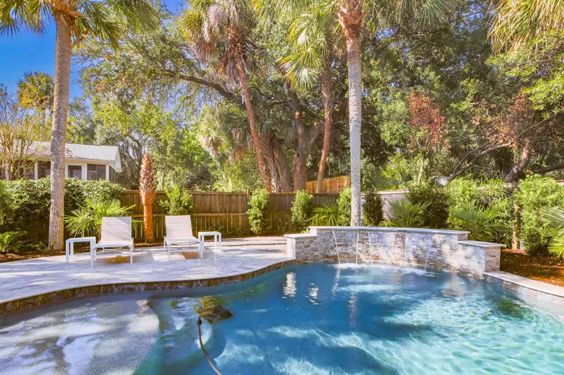 The private pool has a baja shelf and a soothing waterfall.