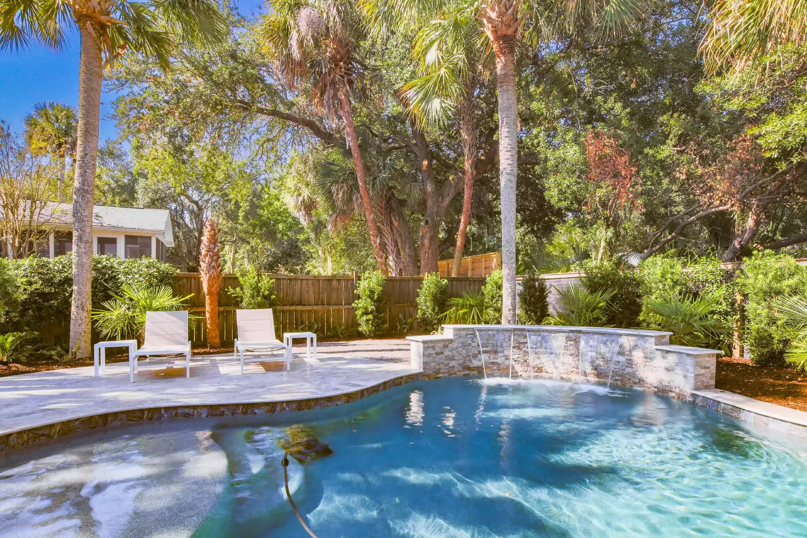 The private pool has a baja shelf and a soothing waterfall.