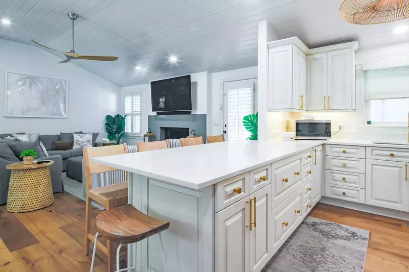 You may also access the back deck through the door in between the kitchen and living room.