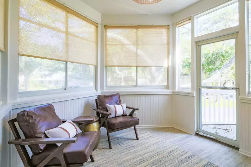 This seating area in the master suite sunroom is the perfect spot for enjoying your morning coffee.