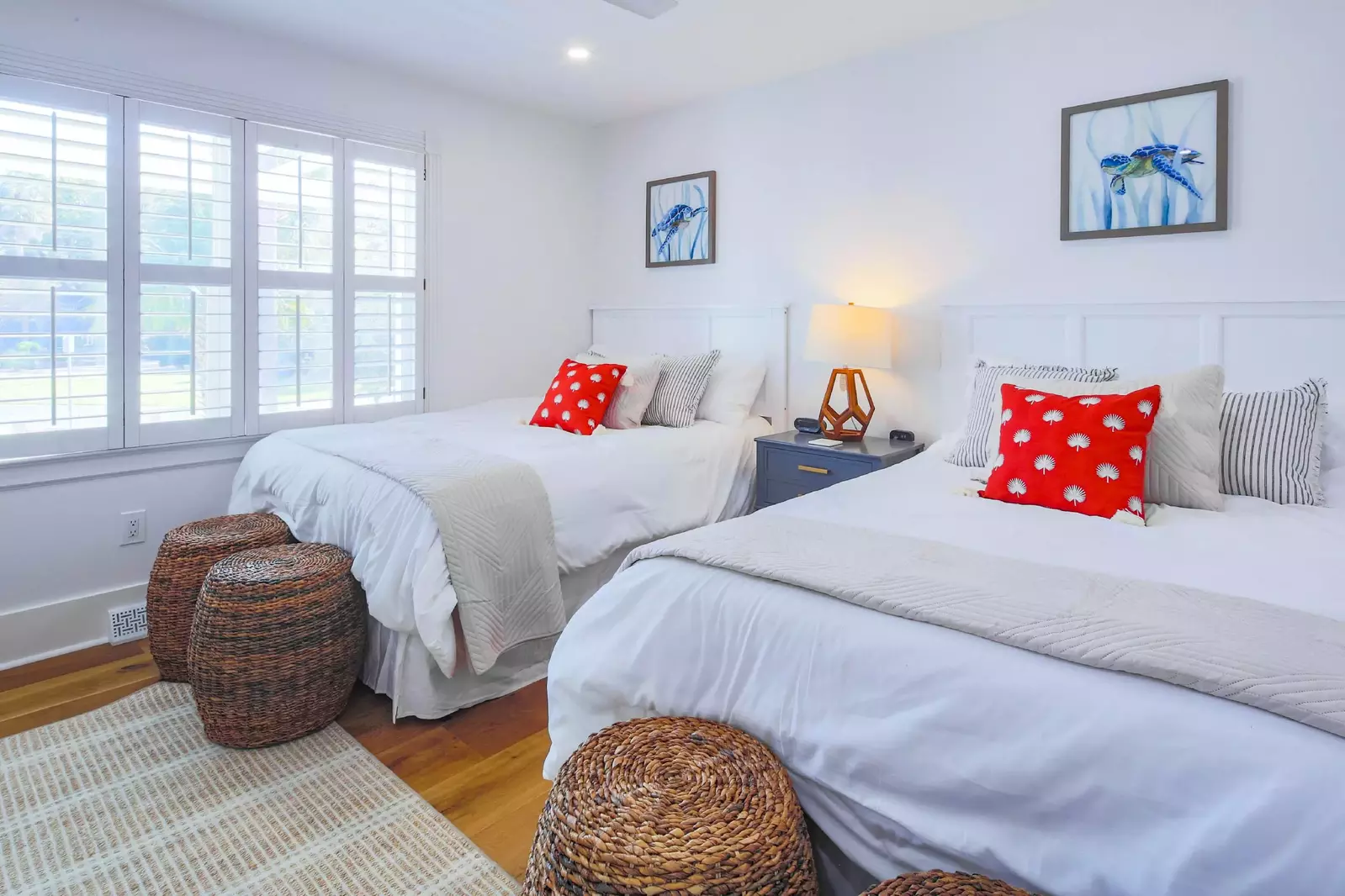 The queen bedroom looks out onto the home's front yard.