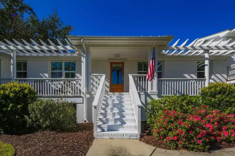 This exterior staircase leads to the home's front porch and front door.