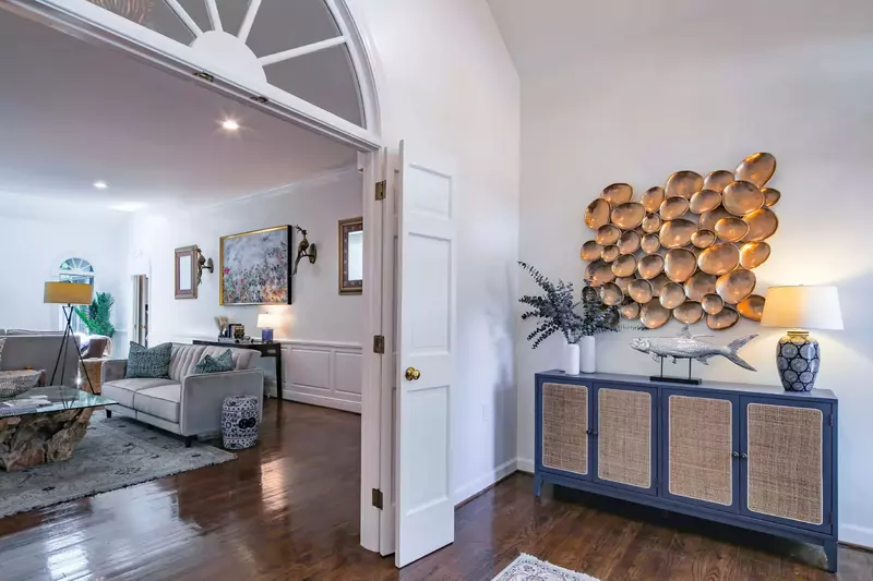 When you enter the home, you'll find this foyer that leads to the living room and bunk bedroom.