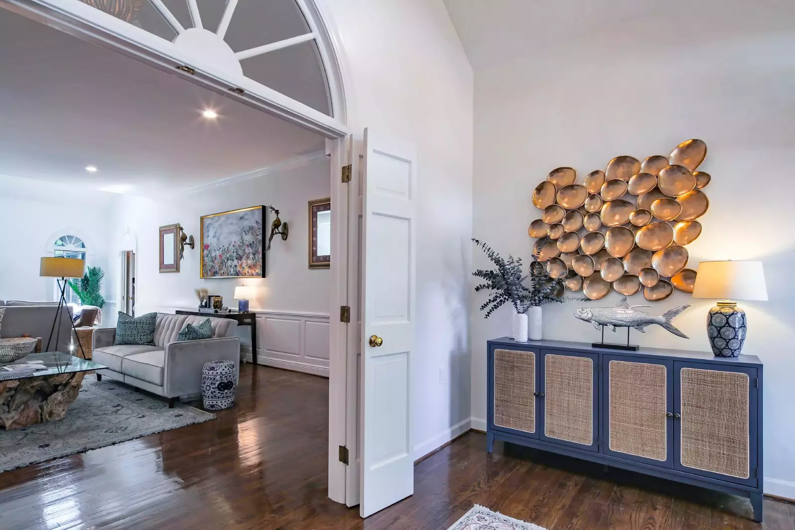 When you enter the home, you'll find this foyer that leads to the living room and bunk bedroom.