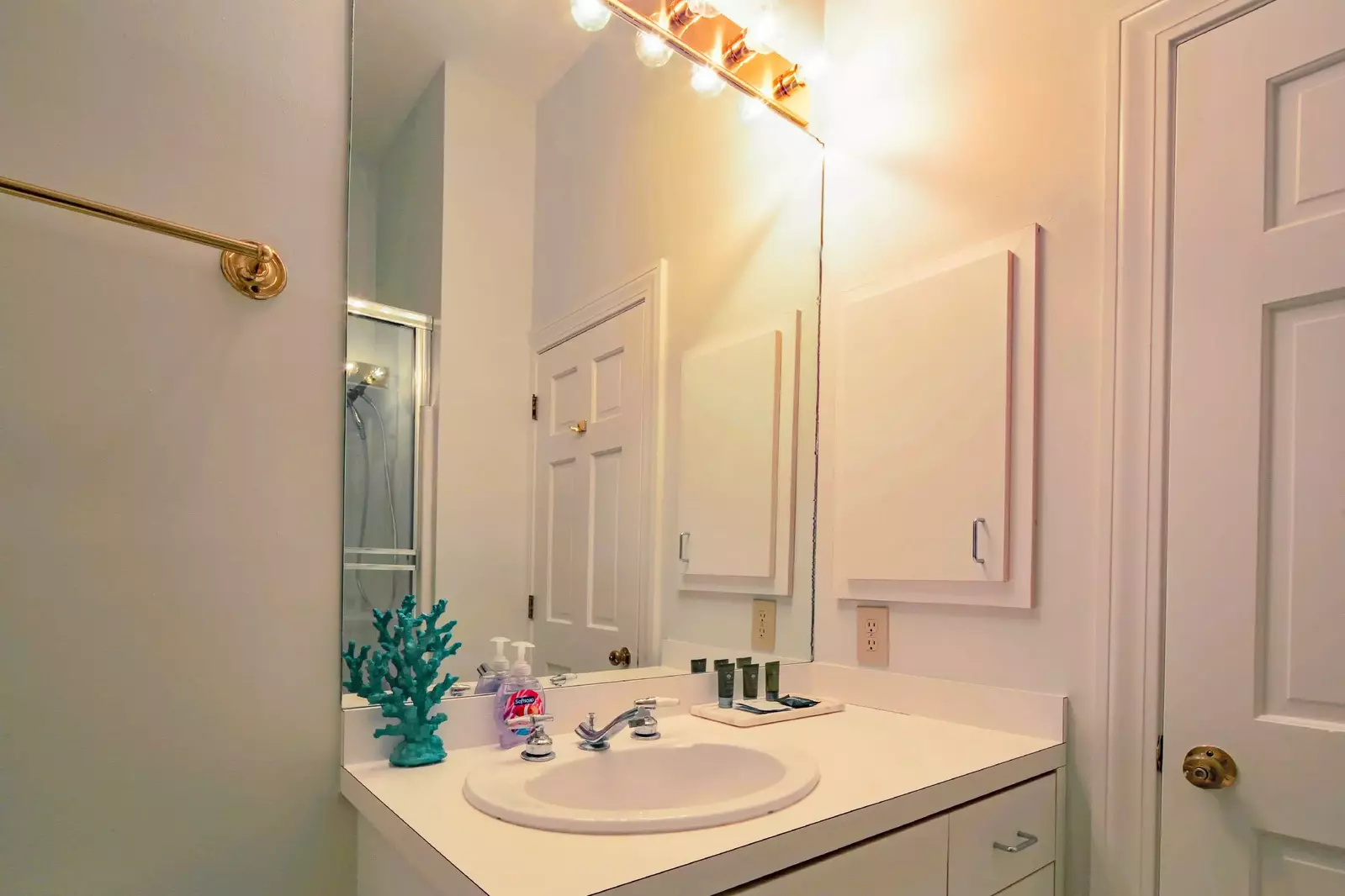 There is another vanity inside the en suite bathroom.