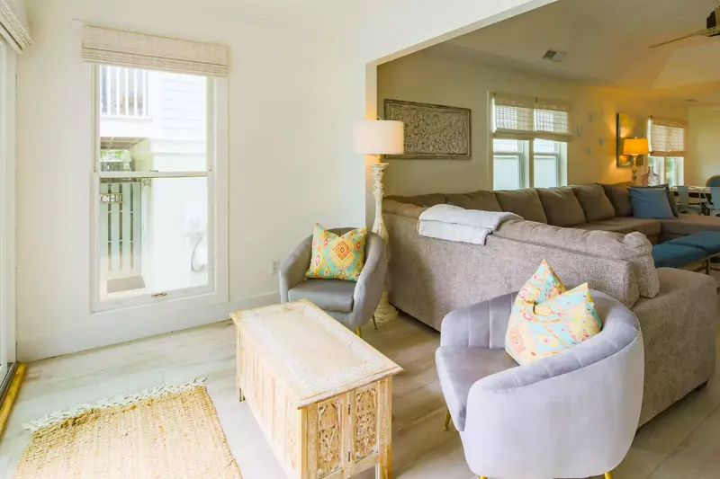 This seating area in between the living room and back deck is the perfect spot to watch the golfers.