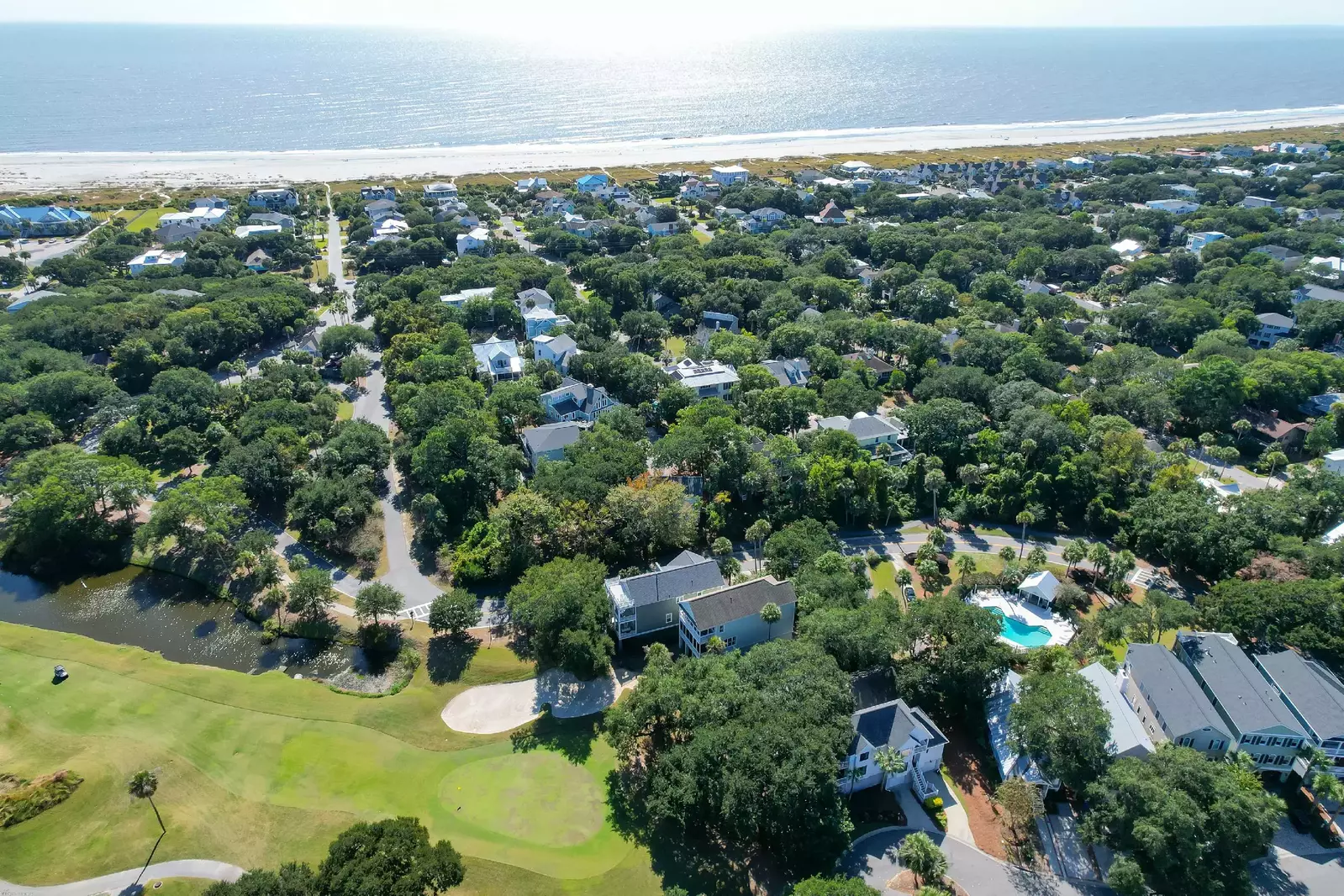 Guests of The Beach Cove may access the community pool and enjoy a relaxing stroll to the beach.