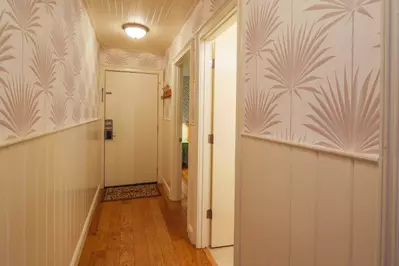 When you enter the front door, you will find this hall that connects you to the bedroom, bathroom and great room.