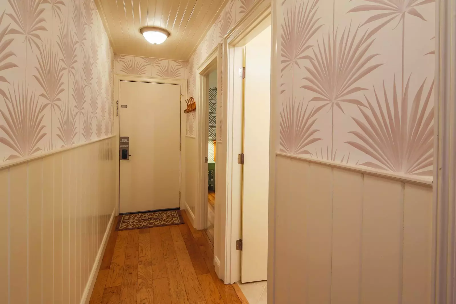 When you enter the front door, you will find this hall that connects you to the bedroom, bathroom and great room.