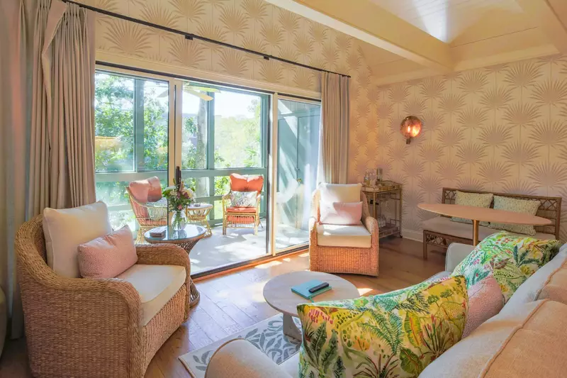 In the great room, you will find this comfortable living room, dining area and door to the porch.